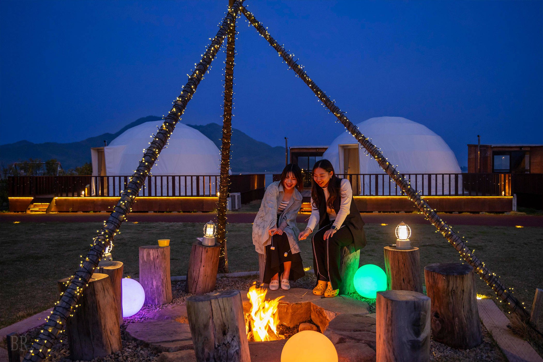 Women enjoying the planetarium inside the dome